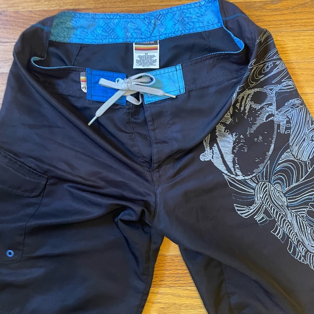 Hang Ten Black Board Shorts with Graphic Designs